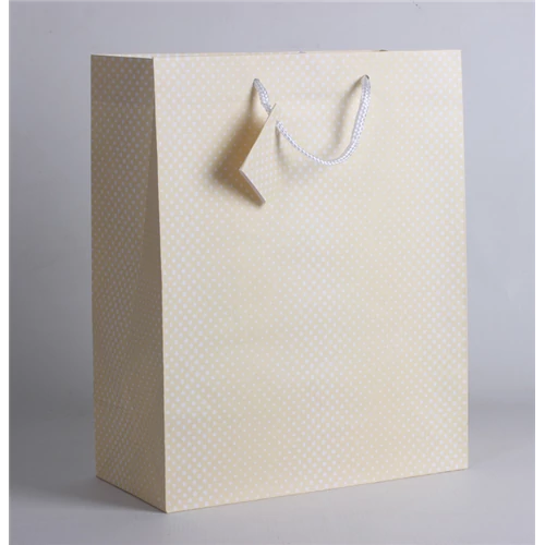 Dísztasak krém-fehér pöttyös 33 x 26 cm